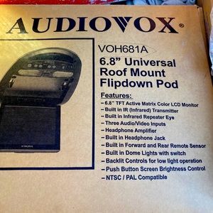 Rear facing car mounted DVD player